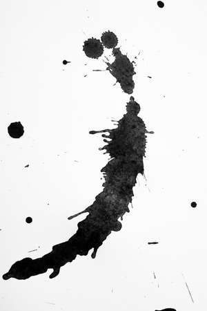 Ink spots on white paperの写真素材