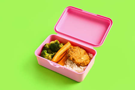 Lunch box with tasty food on color backgroundの写真素材