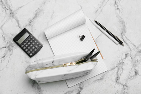 Pencil case and stationery on light backgroundの写真素材