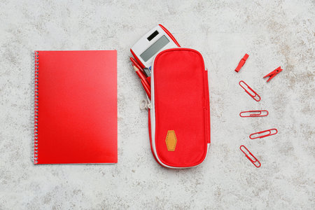 Pencil case and stationery on light backgroundの写真素材