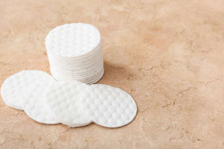 New clean cotton pads on color backgroundの写真素材