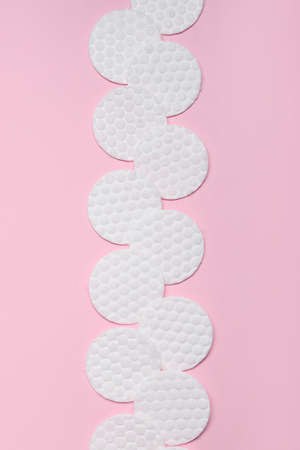Clean soft cotton pads on color backgroundの写真素材