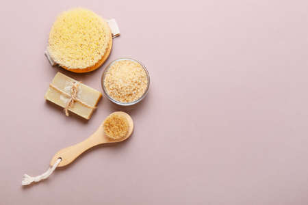Different massage brushes and bath supplies on color backgroundの写真素材