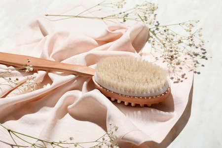 Massage brush on marble backgroundの写真素材