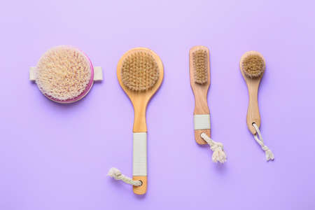 Different massage brushes on color backgroundの写真素材