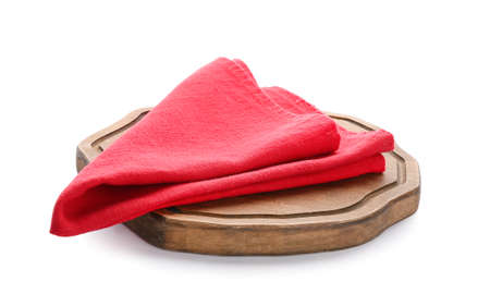 Wooden board with napkin on white backgroundの写真素材
