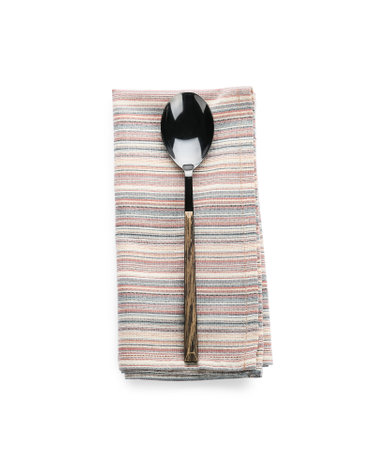 Spoon with napkin on white backgroundの写真素材