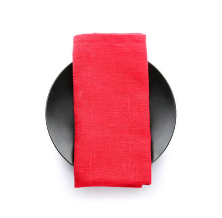 Plate with napkin on white backgroundの写真素材