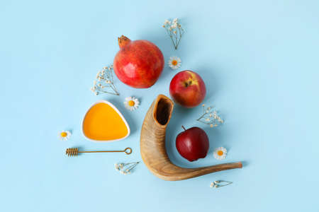 Symbols of Rosh hashanah (Jewish New Year) on color backgroundの写真素材