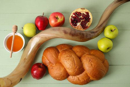 Symbols of Rosh hashanah (Jewish New Year) on color wooden backgroundの写真素材