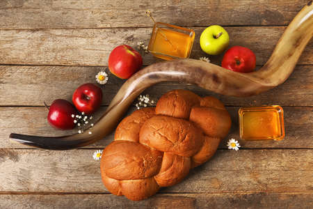 Symbols of Rosh hashanah (Jewish New Year) on wooden backgroundの写真素材