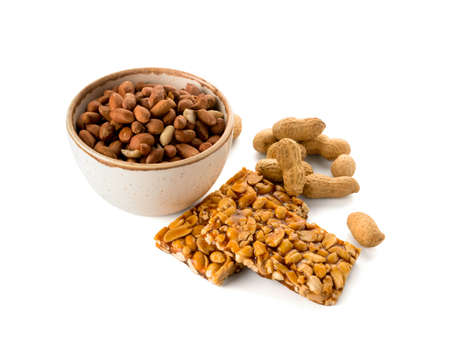 Tasty peanut brittle on white backgroundの写真素材