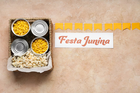 Box with traditional food for Festa Junina (June Festival) on color backgroundの写真素材