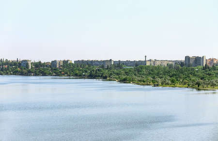 View of beautiful city with river on sunny day