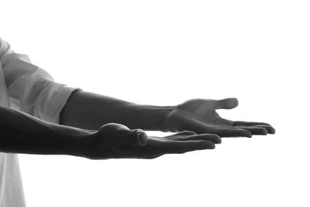 Silhouette of male hands isolated on whiteの写真素材