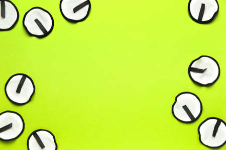 Reusable cotton pads on green backgroundの写真素材