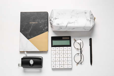 Pencil case, eyeglasses and stationery on white backgroundの写真素材