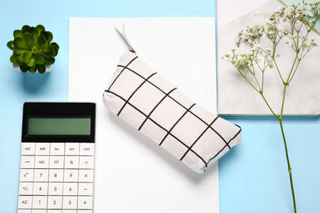 Stylish pencil case and stationery on color background, closeupの写真素材