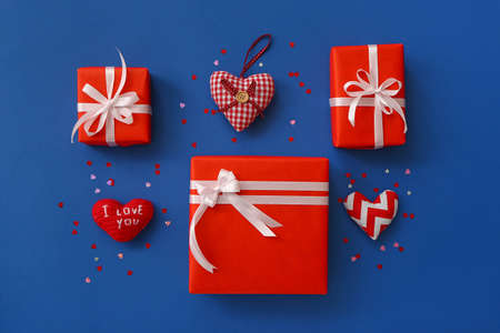 Valentine's Day gifts and hears on color backgroundの写真素材