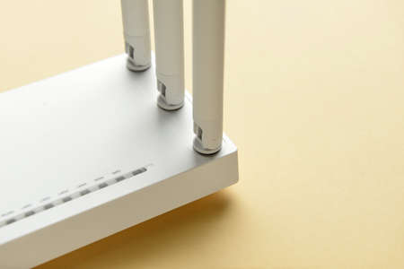 White wi-fi router on color backgroundの写真素材