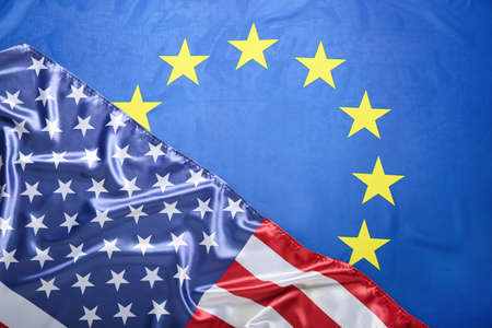 Flags of European Union and USA as background, closeup