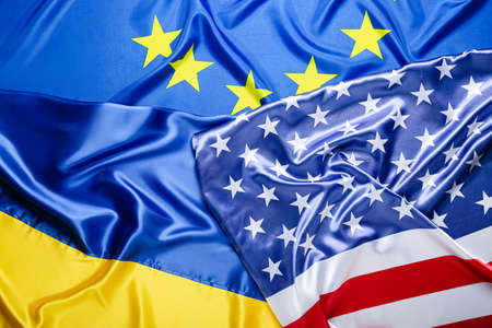 Flags of European Union, USA and Ukraine as background, closeupの写真素材