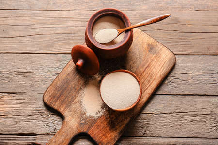 Composition with active dry yeast on wooden backgroundの写真素材