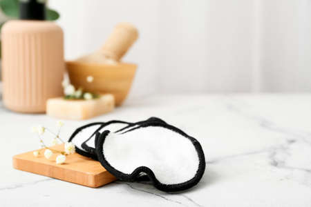 Set of reusable makeup pads on light tableの写真素材