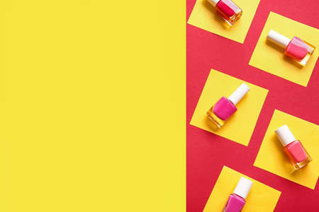 Different nail polishes on color backgroundの写真素材