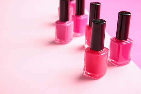 Different nail polishes on color backgroundの写真素材