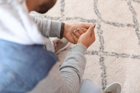 Male hands with trendy manicure on light background, closeupの写真素材