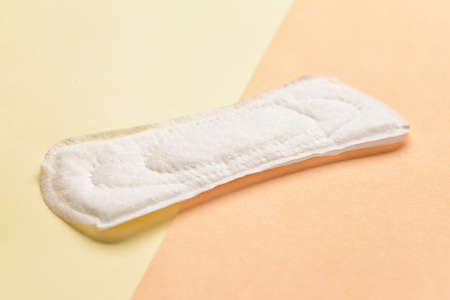 Menstrual pad on yellow backgroundの写真素材