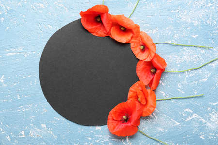 Blank card with beautiful red poppy flowers on color background