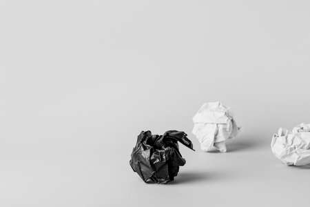 Crumpled papers on white background. concept of racismの写真素材