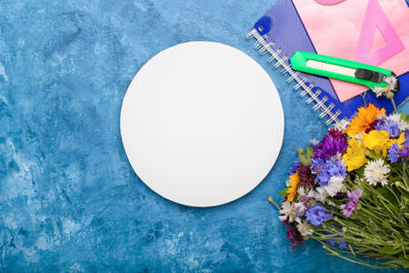 Blank card, bouquet of beautiful flowers and stationery on color background, closeup. teacher's day celebrationの写真素材