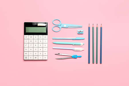 school supplies on color background