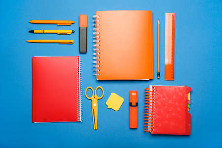 school supplies on color background