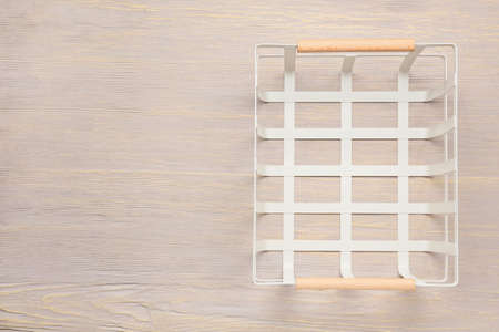 Empty organizer on light wooden background