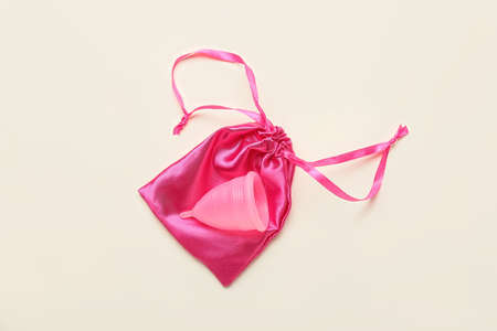 Menstrual cup and bag on light backgroundの写真素材