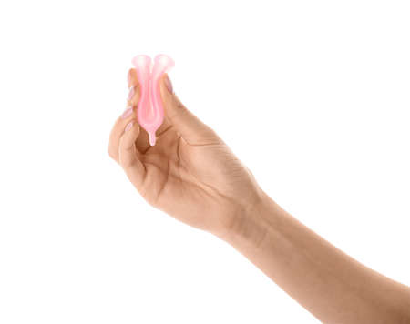 Female hand with menstrual cup on white backgroundの写真素材
