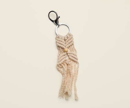 Handmade cotton keychain on light background