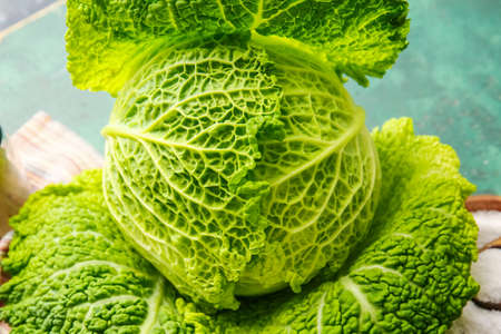 Fresh savoy cabbage on color background, closeupの写真素材