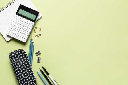 Stationery supplies on color background