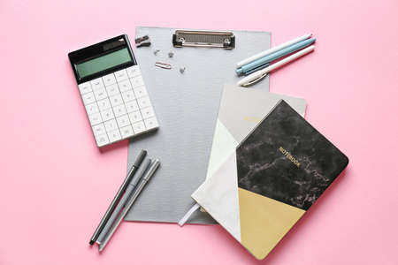 Stationery supplies on color backgroundの写真素材
