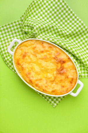 Casserole with mashed potatoes on color backgroundの写真素材