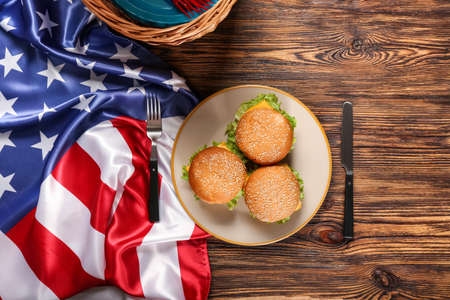 Burgers with American flag on wooden backgroundの写真素材