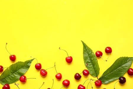 Tasty ripe cherry on color backgroundの写真素材