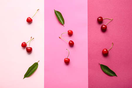 Tasty ripe cherry on color background