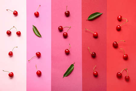Tasty ripe cherry on color backgroundの写真素材