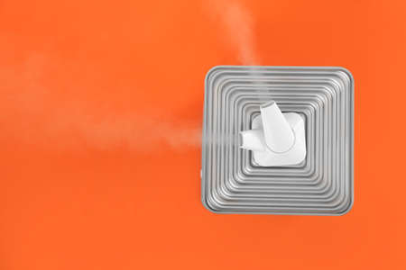 Modern humidifier on color backgroundの写真素材